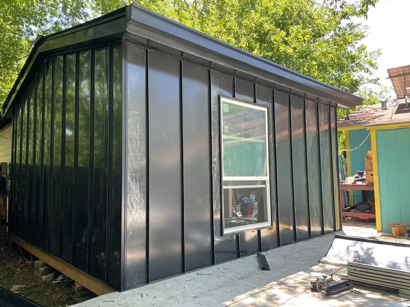 Black standing seam metal wall panels for Metal Roof Installation in Mango